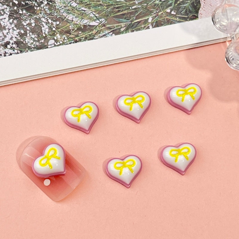 GLOSSY BOW HEARTS